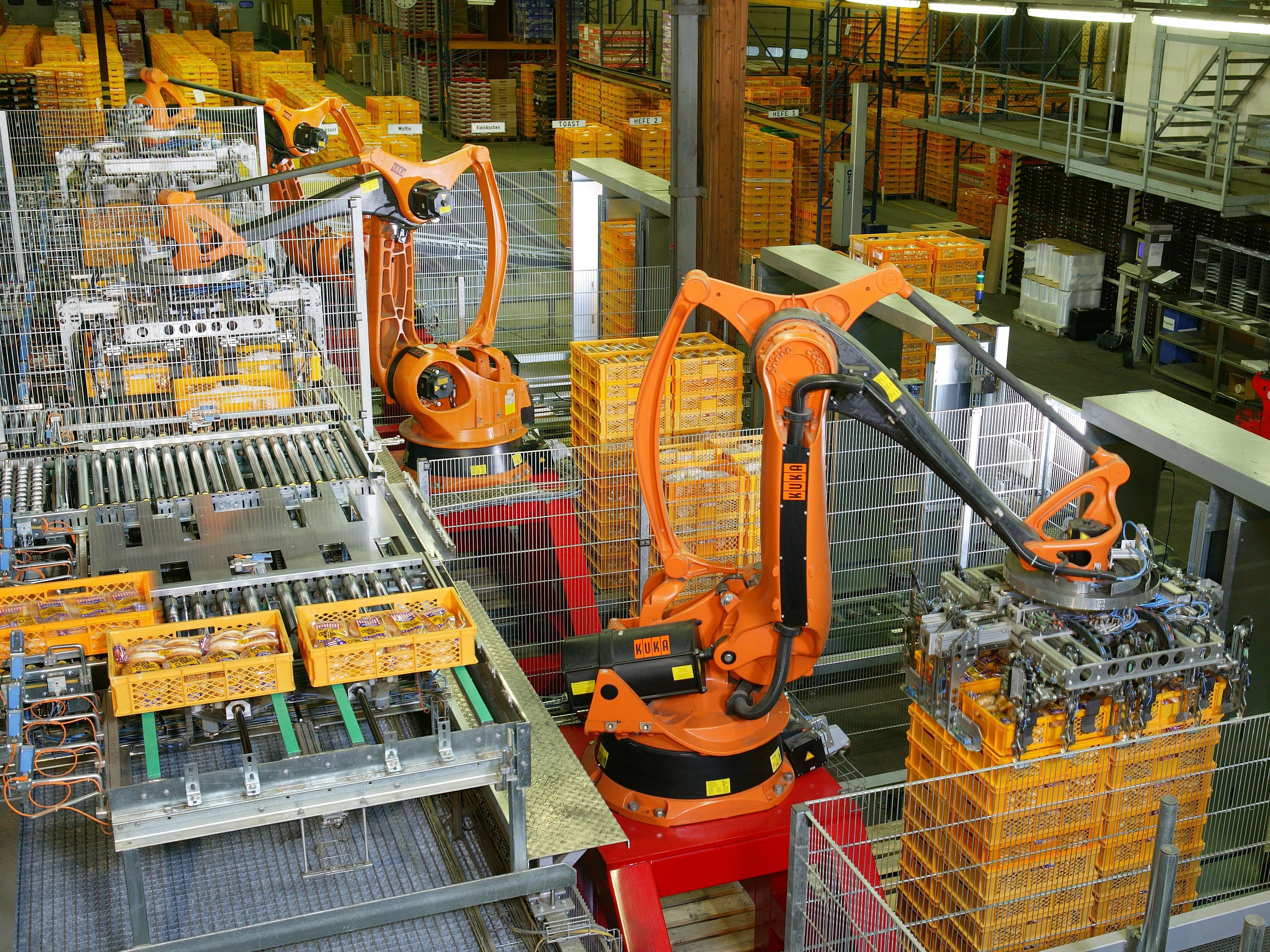 Przemysłowy robot KUKA · paletyzacja na linii produkcyjnej (przykład typowej aplikacji)